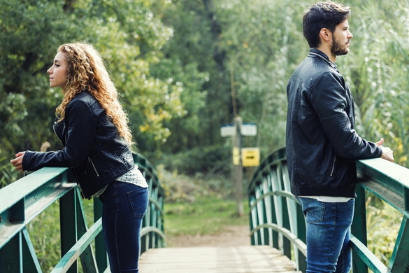 Couple after a conflict in a park - How To Know If A Taurus Man Does Not Like You