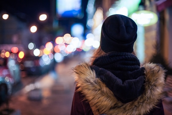 Back view of a hipster girl walking on city street at night - Taurus Man And Libra Woman Breakup