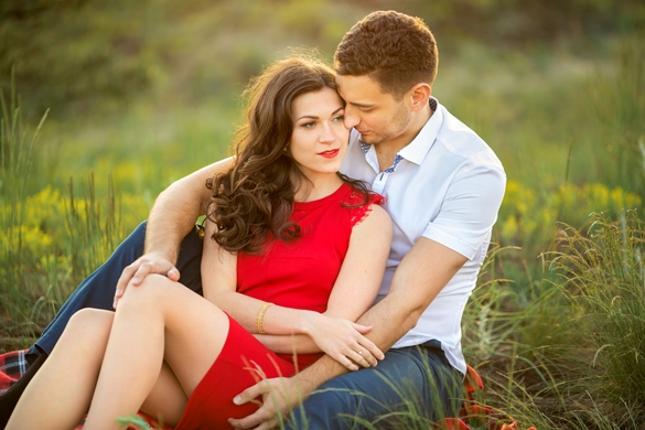 Beautiful Young Couple relaxing in Park - Taurus Man In Bed With An Aquarius Woman
