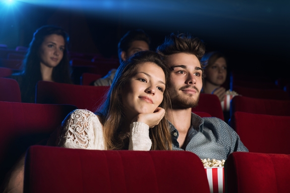 Young loving couple at the cinema watching a movie - How To Help A Taurus Man That Is Depressed